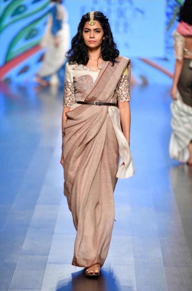 Conceptual drapes and interesting blouses on the ramp of Nirmooha by Prreeti Jaiin Nainutia at Lotus India Fashion Week 2018