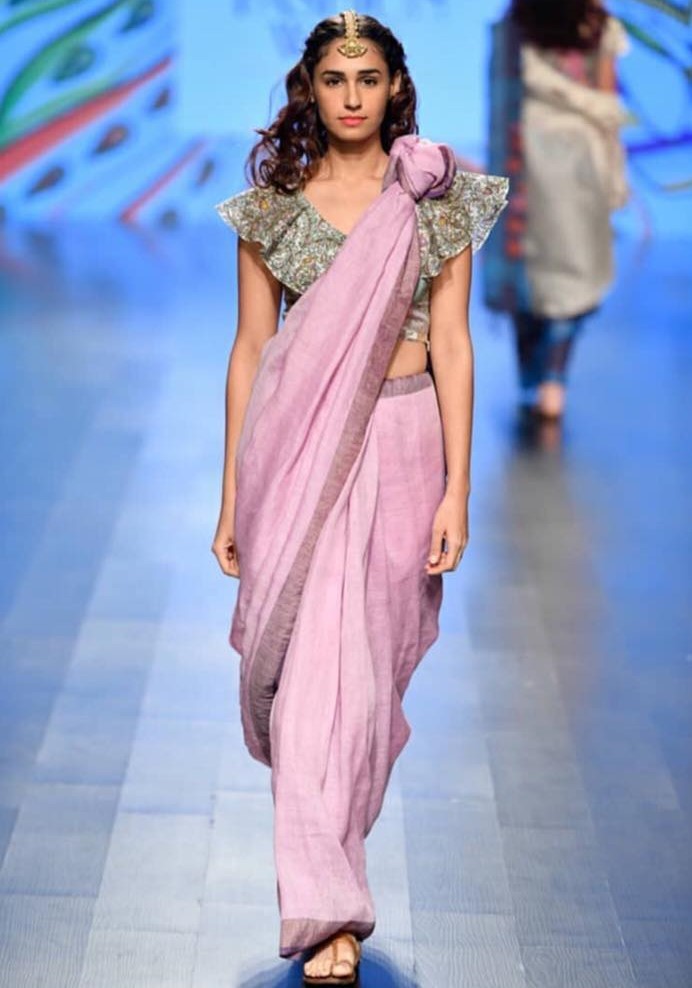 Conceptual drapes and interesting blouses on the ramp of Nirmooha by Prreeti Jaiin Nainutia at Lotus India Fashion Week 2018