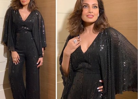 Bollywood diva Bipasha Basu Singh Grover looks lovely wearing a black sequined jumpsuit by couturier Rajat Tangri styled by celebrity stylist Eshaa Amiin